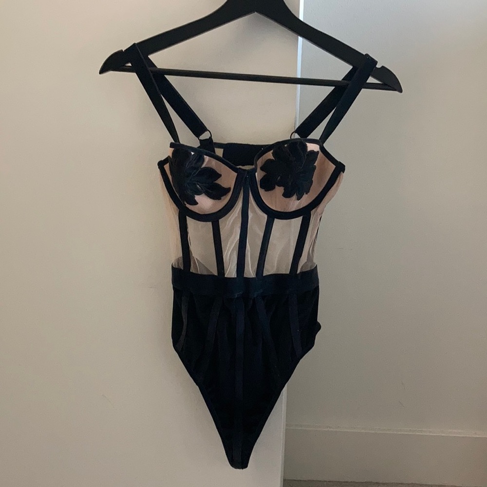 Sexy black and nude bodysuit